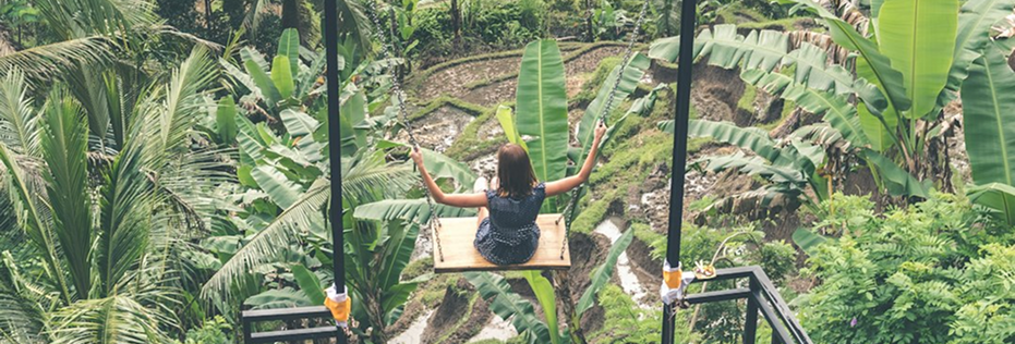 Woman on a swing in Bali